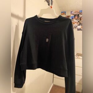 black crew neck "ICON" sweater